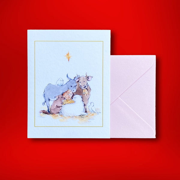 a wtaercolour re-creation of the classic christmas scene. The illustration is set wihtin a frame on a portrait folded card and comes with candy pink envelopes.