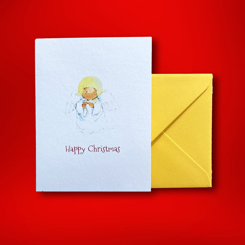 the same angel bear is shown on a portrait folded card with a citrine yellow envelope